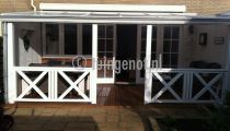 54. hardhouten veranda met polycarbonaatplaten en hekwerk